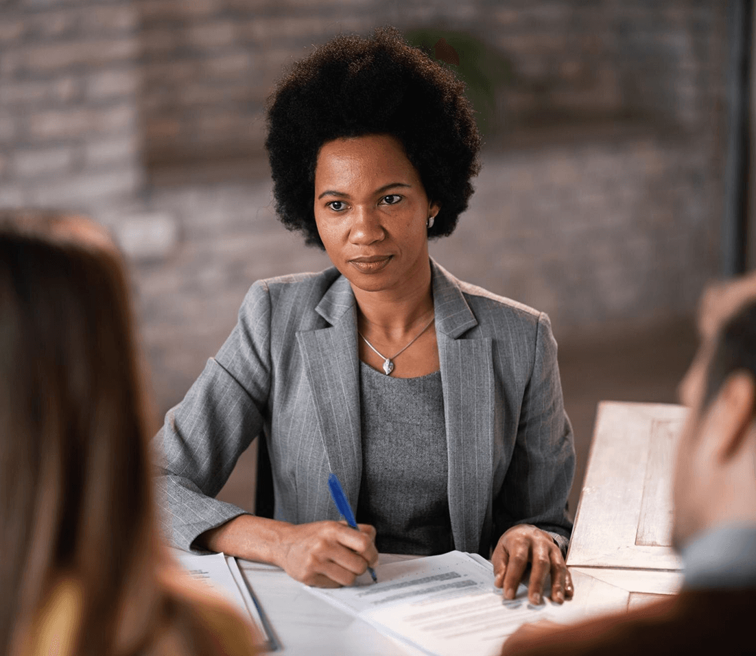 Immigration attorney consulting with client